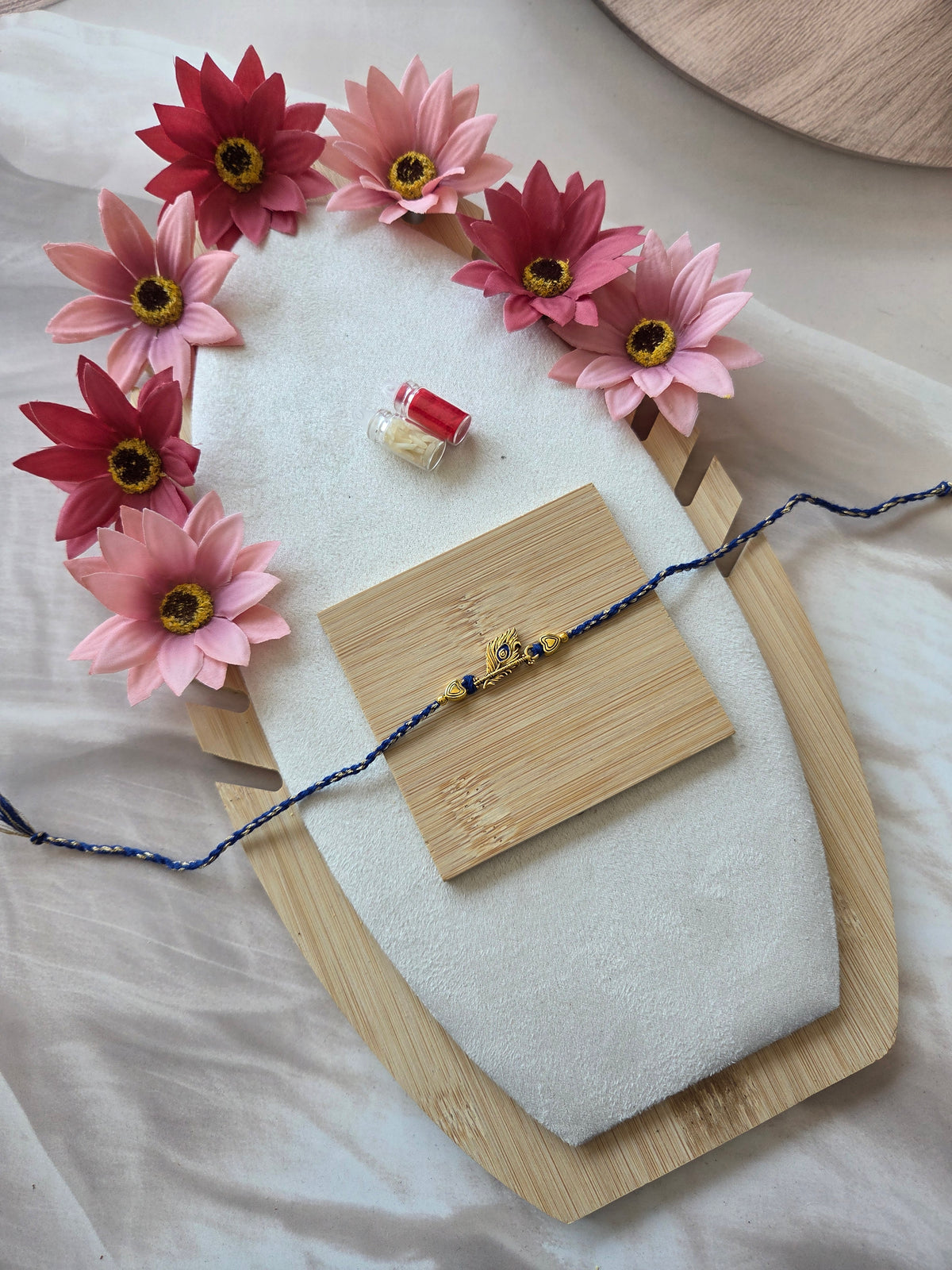 Elegant Peacock Feather Rakhi – Blue Thread Designer Rakhi ( C - 12)