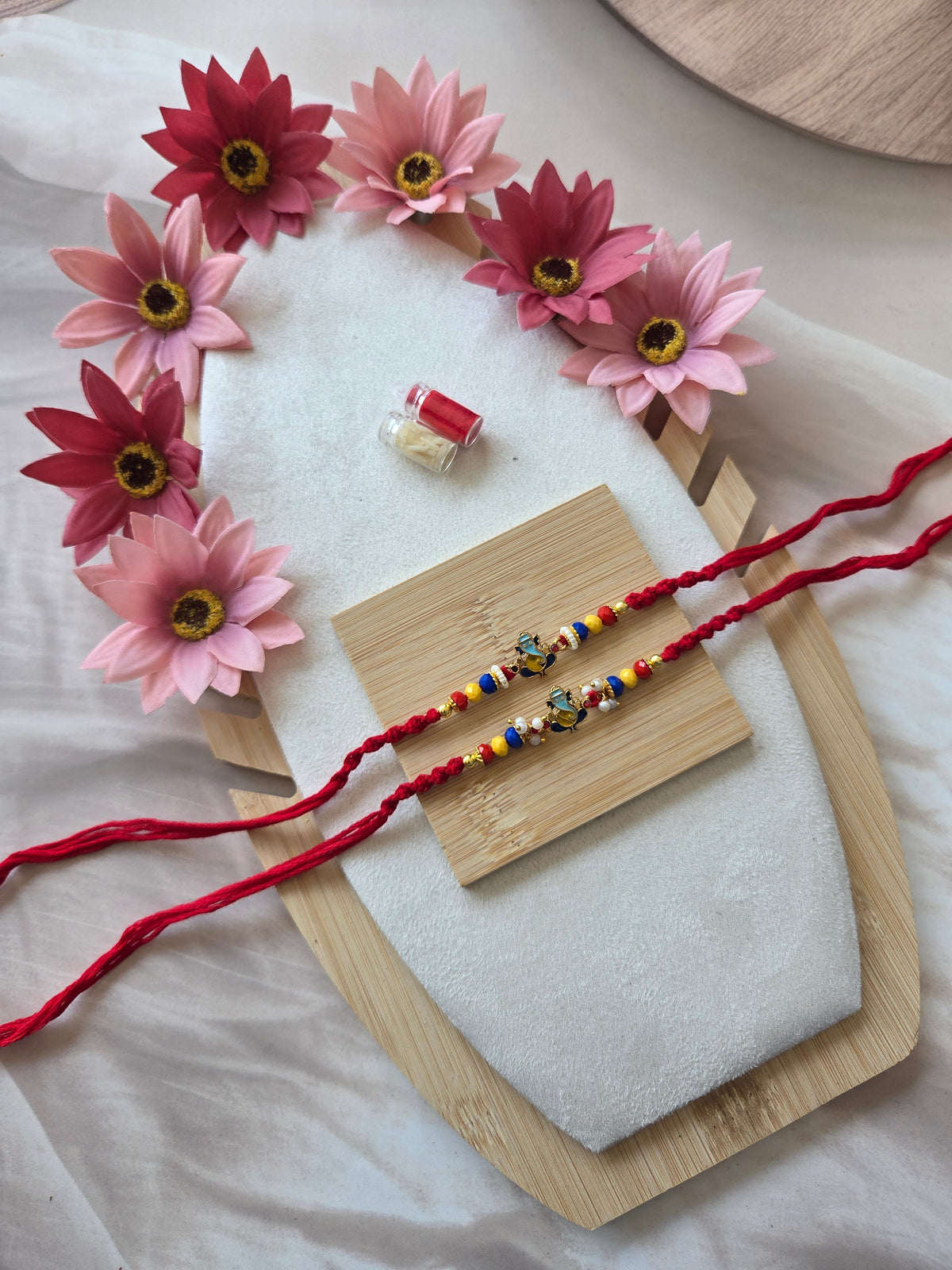 Divine Ganpati Couple Rakhi Set with Multicolor Beads ( C - 64 )