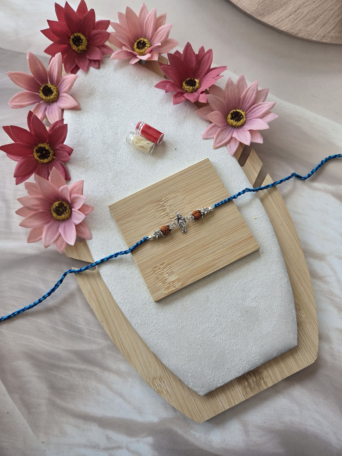 Handmade Blue Thread Rakhi with Krishna Charm ( C - 17 )