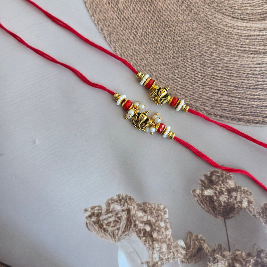 Classic Red Thread Pearl Ganesha Rakhi couple set